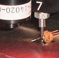 Automated assembly of coaxial laser packages