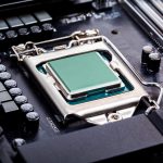 Blank_CPU_lid_top,_socket_cover_view_angle_processor_placed_and_locked_in_the_socket_on_a_brand_new_modern_high_end_gaming_productivity_motherboard_macro_PC_components_assembly_process_concept_closeup